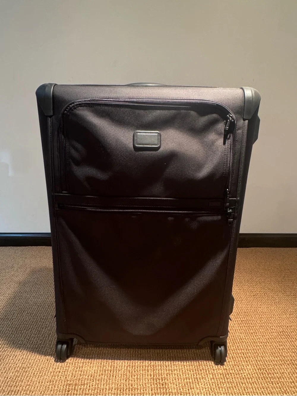 Tumi Black Softside Spinner check luggage with Front Pocket